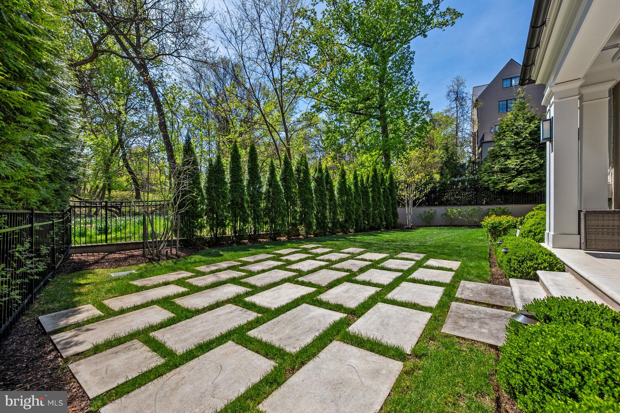 4432 Chestnut Lane Washington, DC 20007 - Photo 11 of 43 Rear yard with pavers and mature plantings