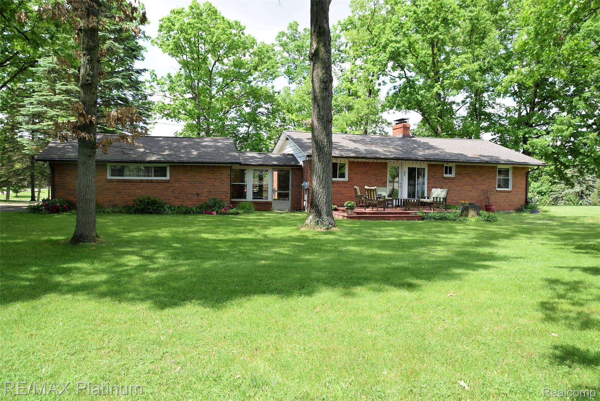 9450 Bennett Lake Road Fenton, MI 48430 - Photo 17 of 24 1back yard.jpg