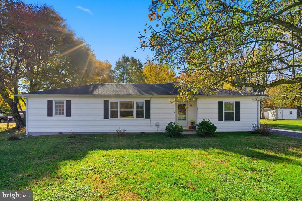 1326 Perrys Corner Road Grasonville, MD 21638 - Photo 6 of 35 a front view of house with yard and green space