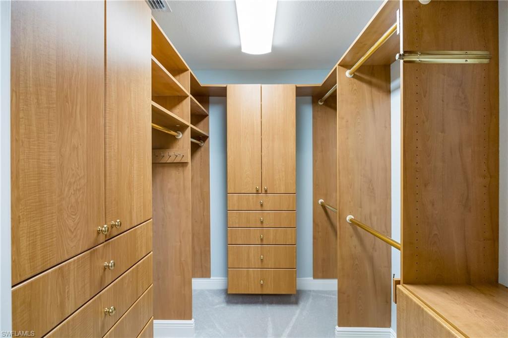 6012 Fairway Court Naples, FL 34110 - Photo 15 of 38 a view of walk in closet