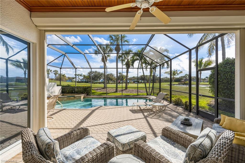 6012 Fairway Court Naples, FL 34110 - Photo 22 of 38 a view of swimming pool with seating area and furniture