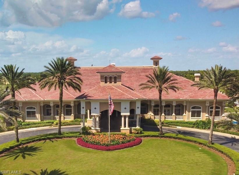 6012 Fairway Court Naples, FL 34110 - Photo 32 of 38 a front view of house with swimming pool and patio