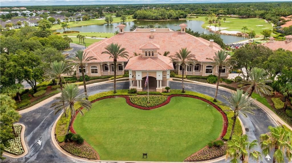 6012 Fairway Court Naples, FL 34110 - Photo 37 of 38 an aerial view of a house with swimming pool and ocean view