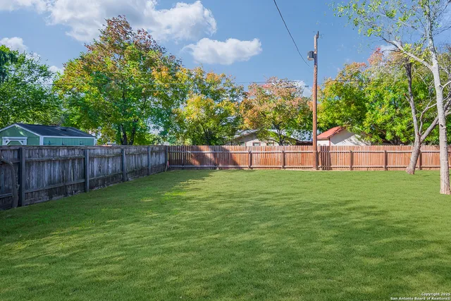 a view of a backyard with a garden