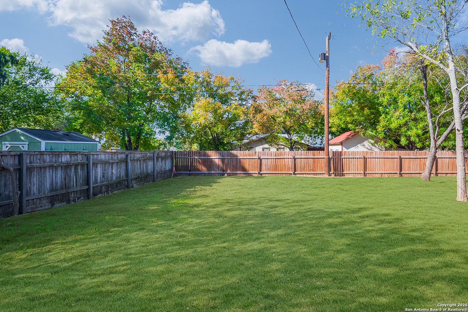 20035 Morrison Street Somerset, TX 78069 - Photo 25 of 25 a view of a backyard with a garden