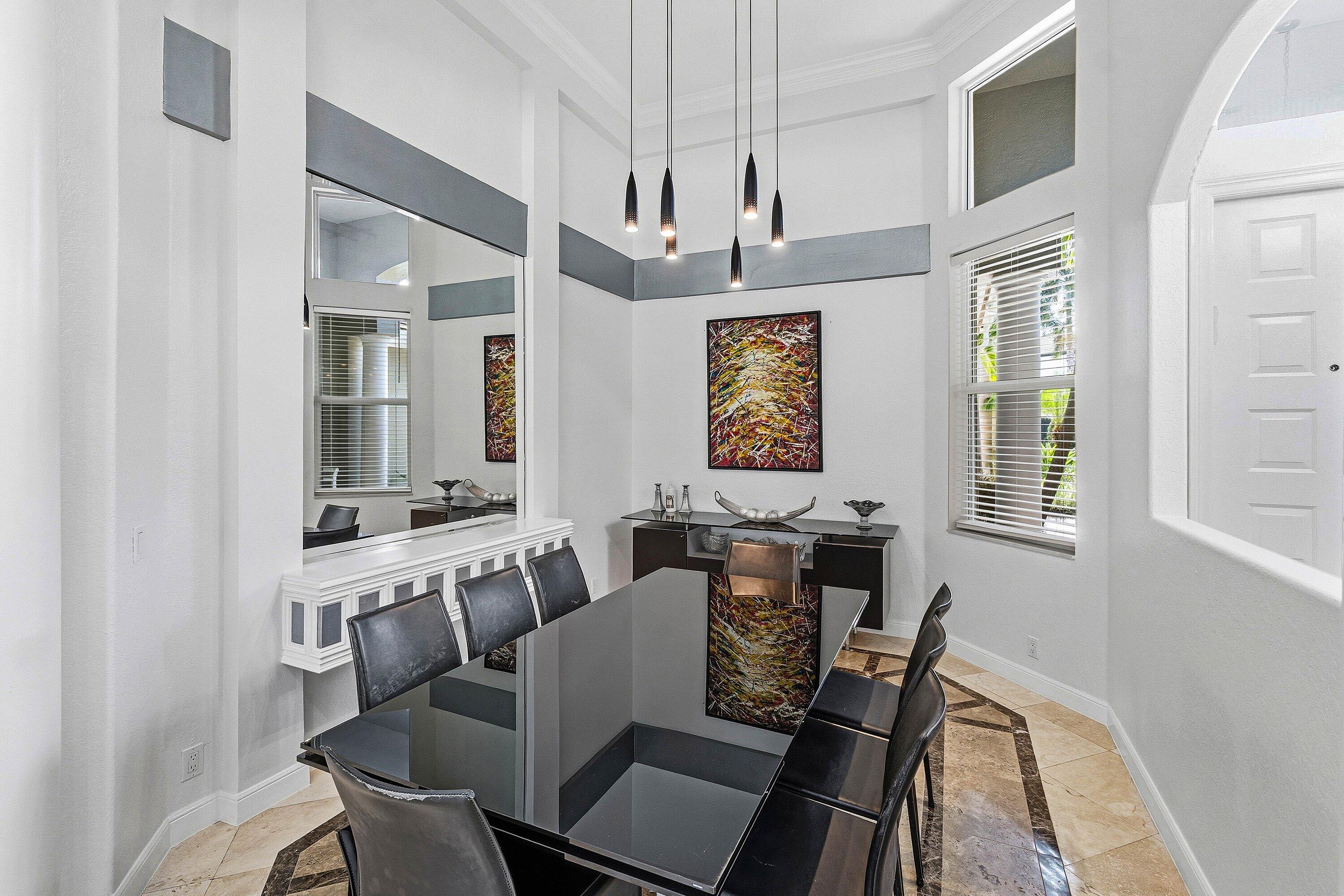 2358 Northwest 49th Lane Boca Raton, FL 33431 - Photo 11 of 47 a view of a a dining room with furniture window and wooden floor