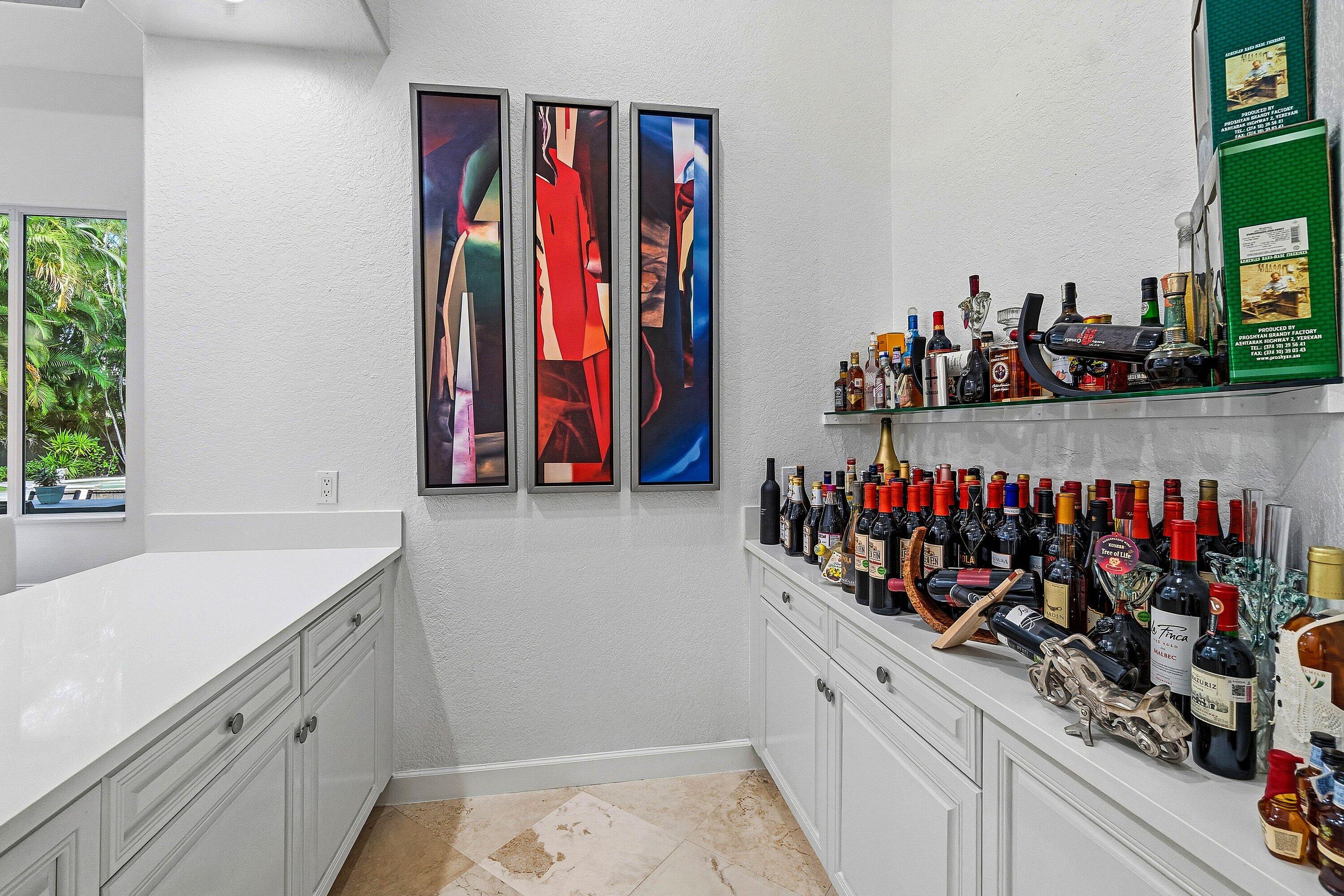 2358 Northwest 49th Lane Boca Raton, FL 33431 - Photo 13 of 47 a view of a kitchen with storage and utility