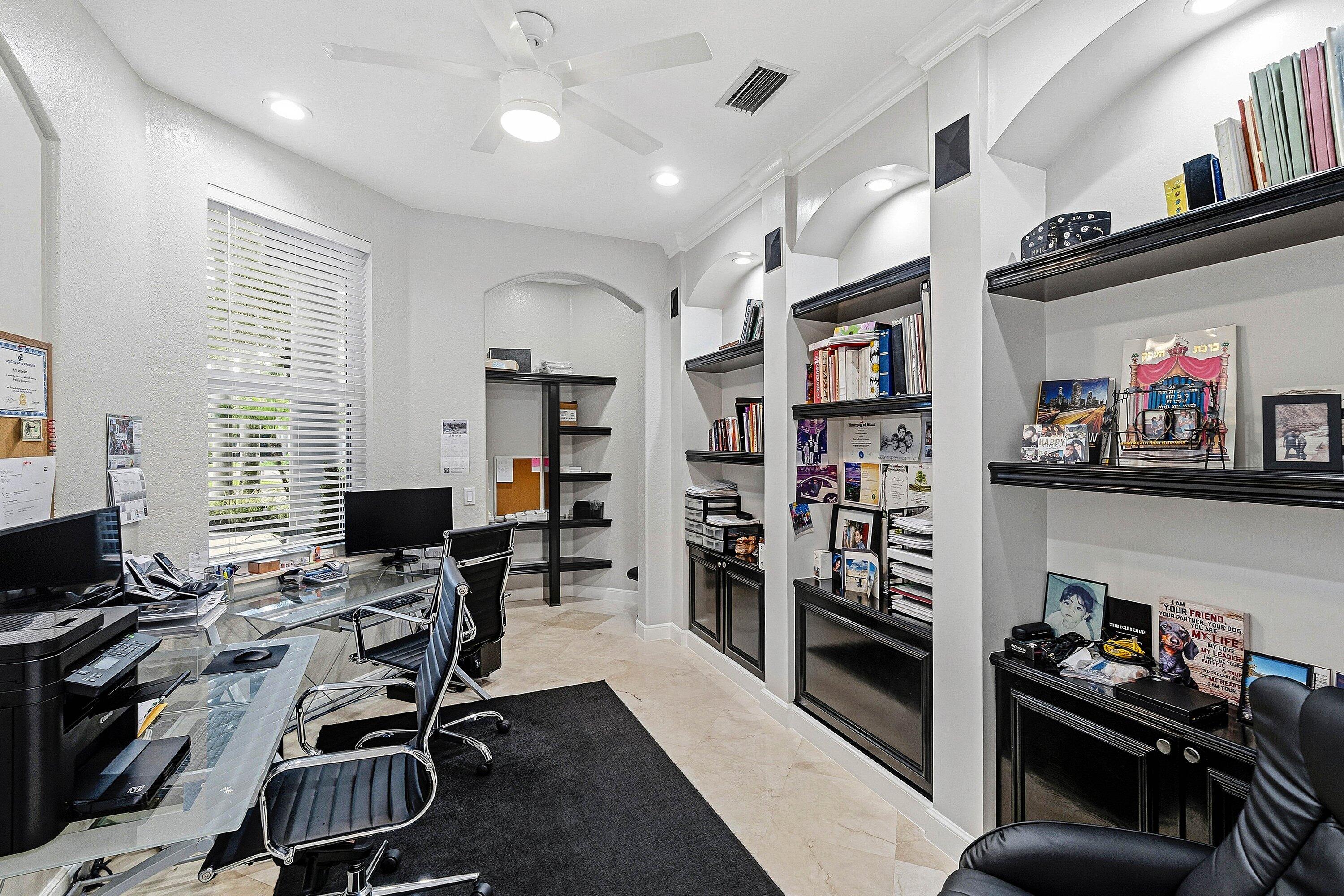 2358 Northwest 49th Lane Boca Raton, FL 33431 - Photo 17 of 47 a view of a workspace with furniture and a window
