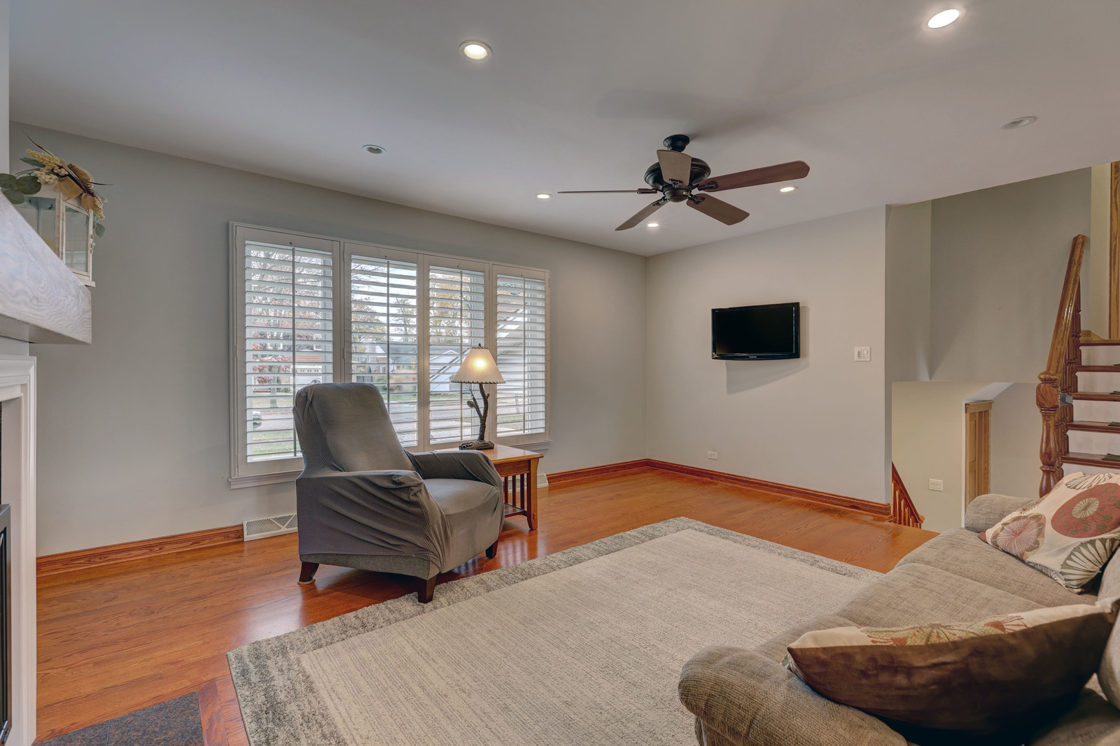 2026 Irwin Avenue Park Ridge, IL 60068 - Photo 16 of 39 a living room with furniture and a ceiling fan