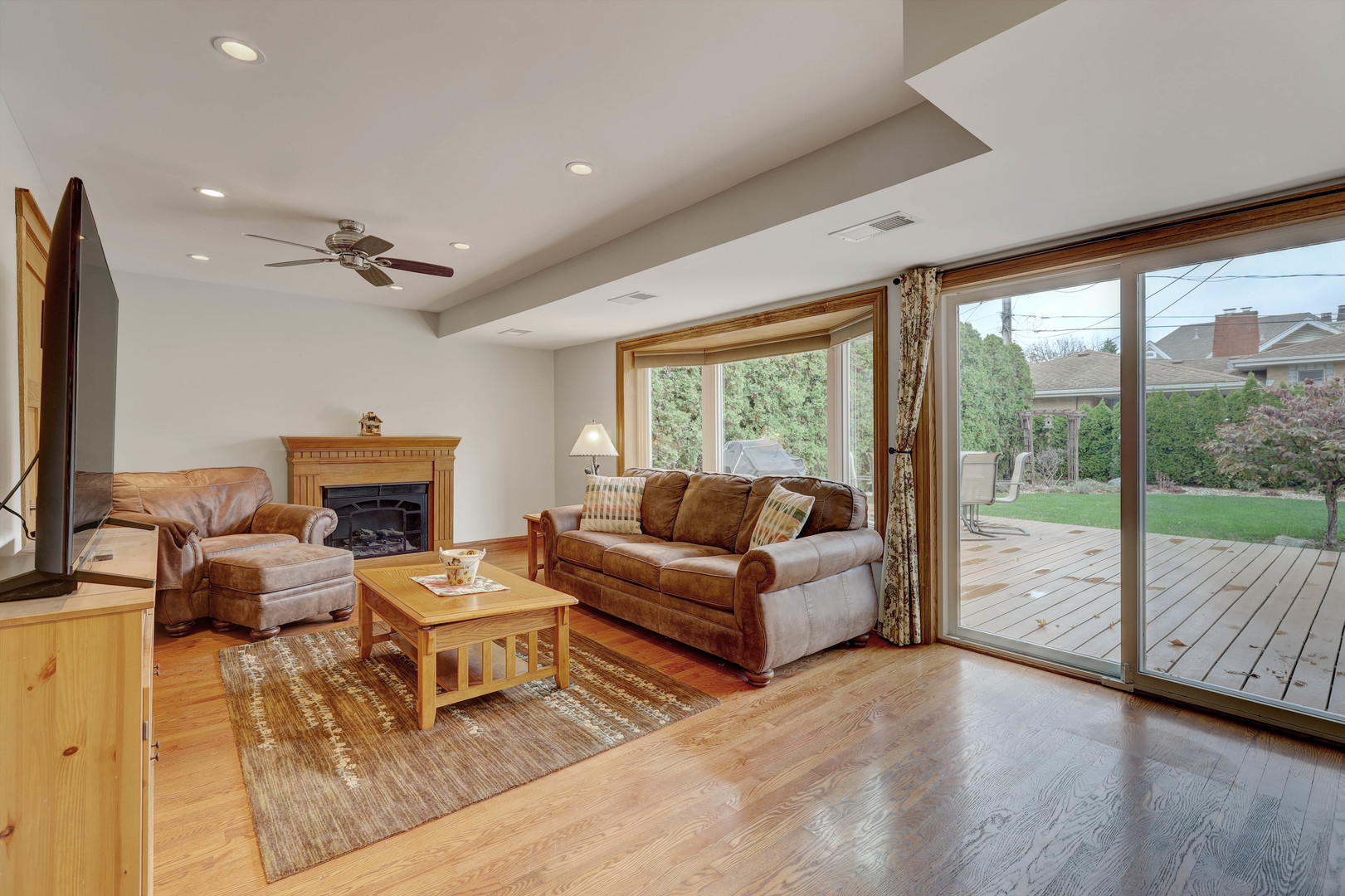 2026 Irwin Avenue Park Ridge, IL 60068 - Photo 4 of 39 a living room with furniture large window and a flat screen tv