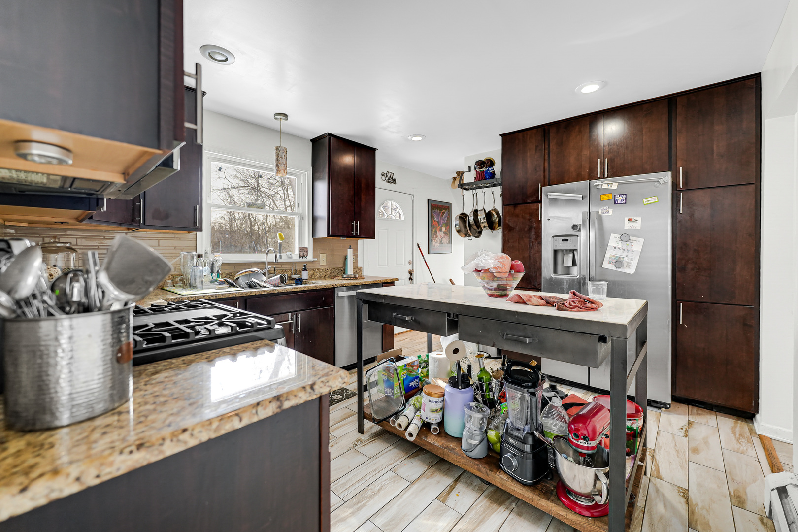 2931 Willow Road Homewood, IL 60430 - Photo 10 of 21 a kitchen with stainless steel appliances granite countertop a refrigerator and a stove