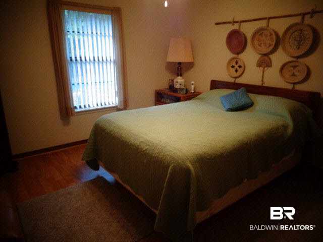 2804 Pine Ridge Drive Lillian, AL 36549 - Photo 24 of 39 12 x 12. Laminate wood look floor. Ceiling fan/light. Closet. Marble window sill.