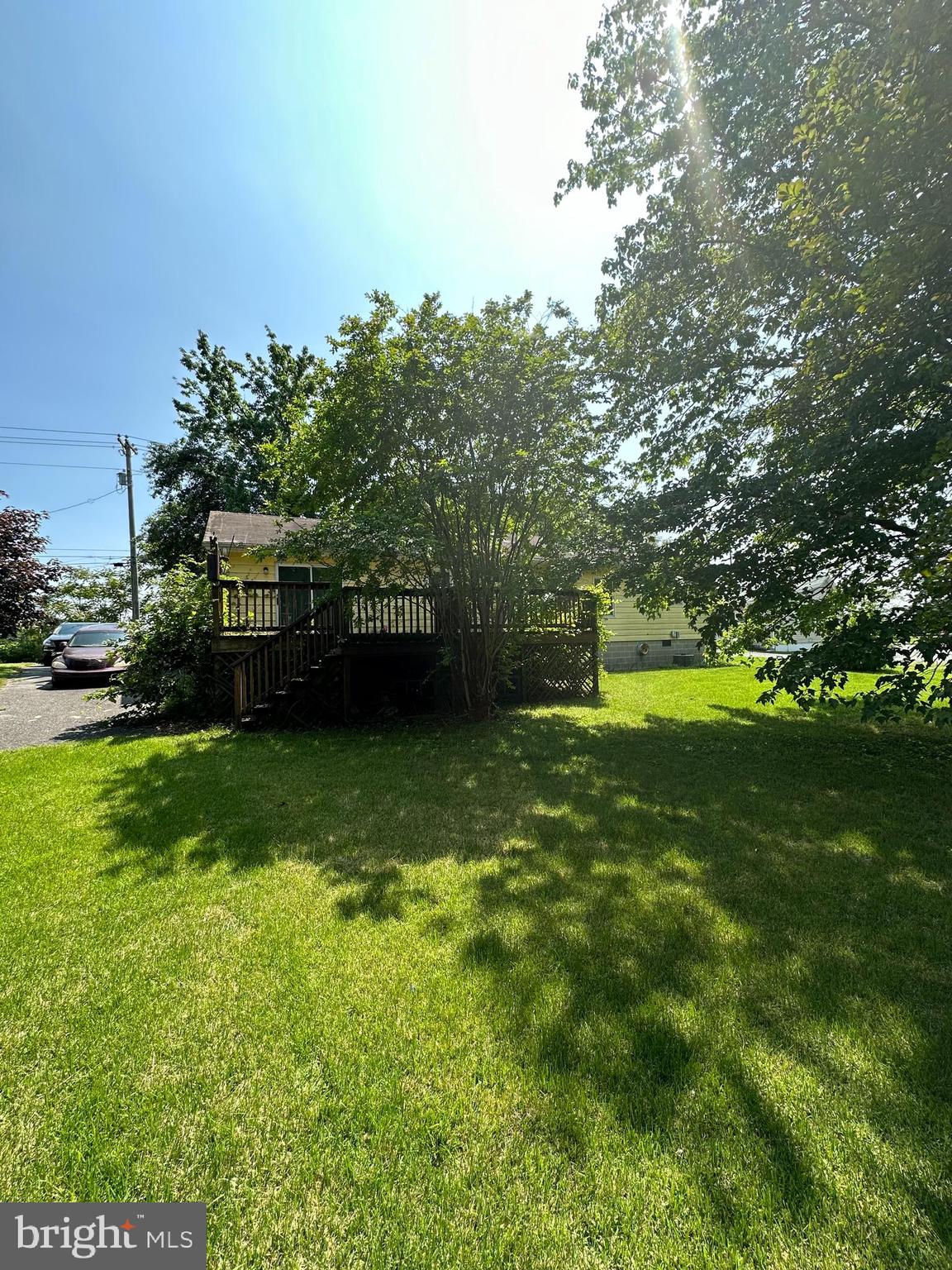 34009 Clay Road Lewes, DE 19958 - Photo 3 of 4 a view of a swimming pool with a garden
