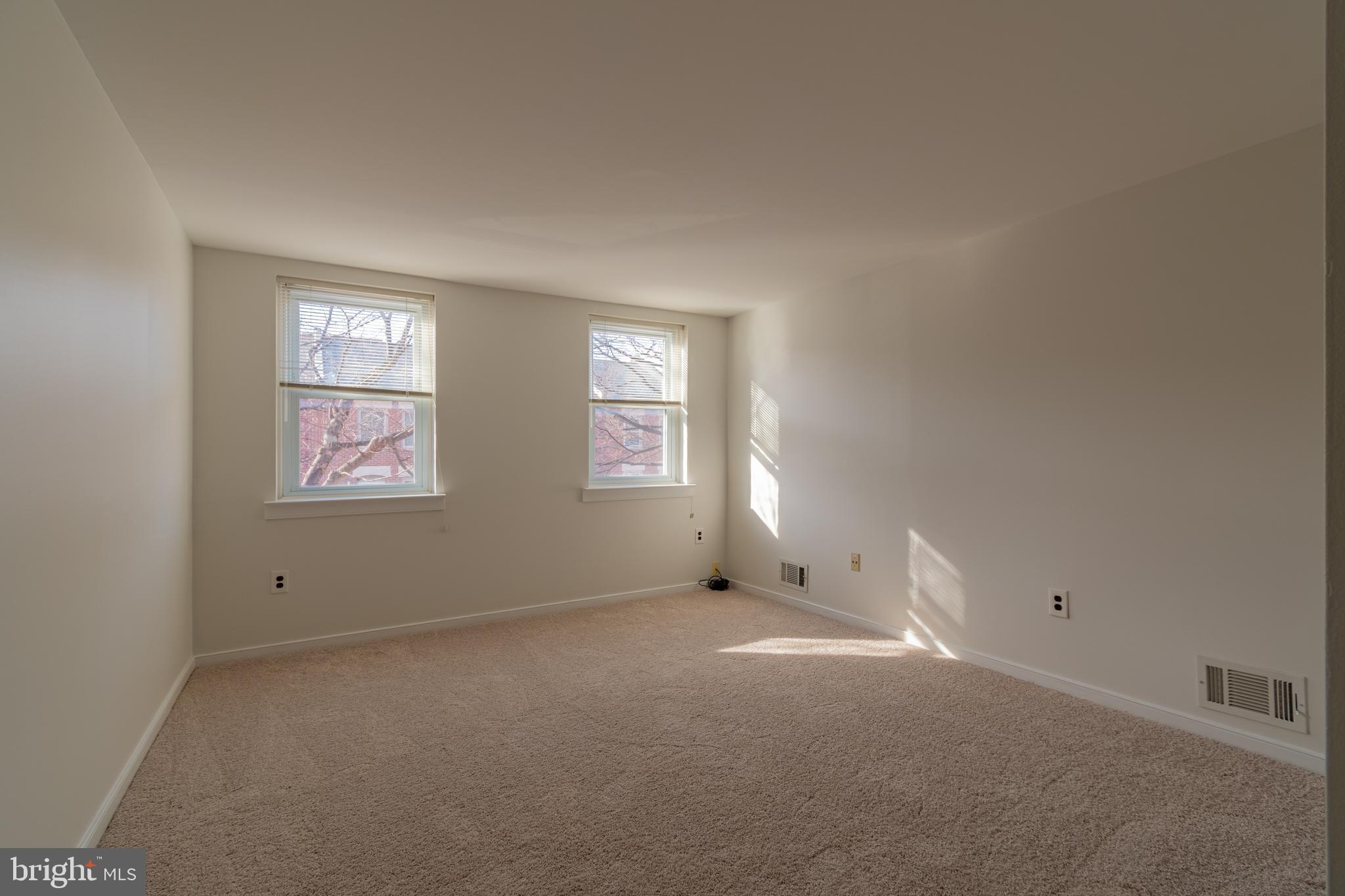 205 Scott Street Baltimore, MD 21230 - Photo 31 of 51 an empty room with windows