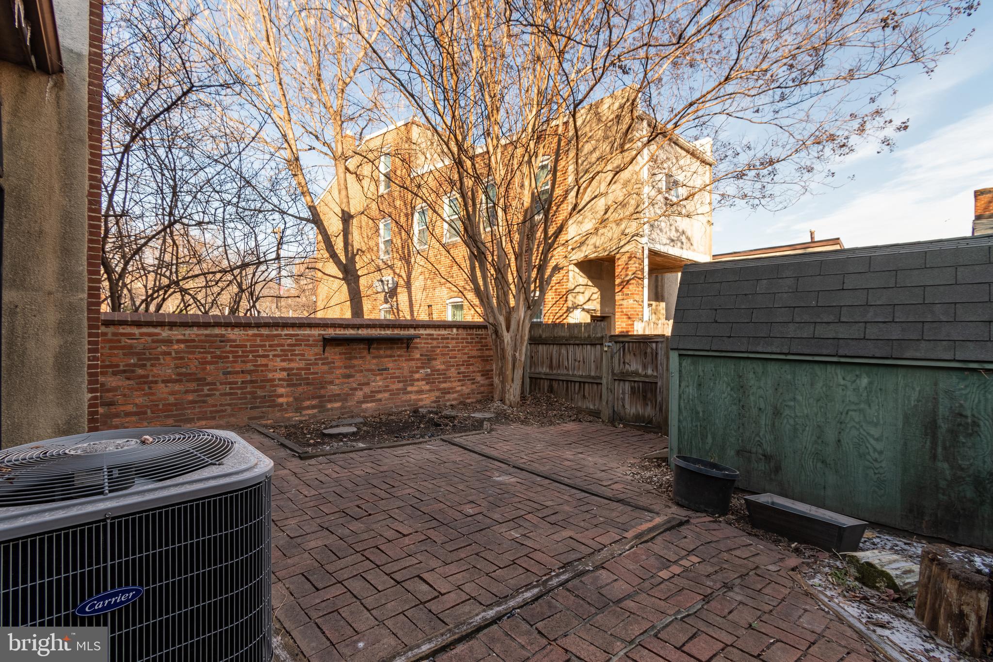 205 Scott Street Baltimore, MD 21230 - Photo 47 of 51 a backyard of a house with lots of green space