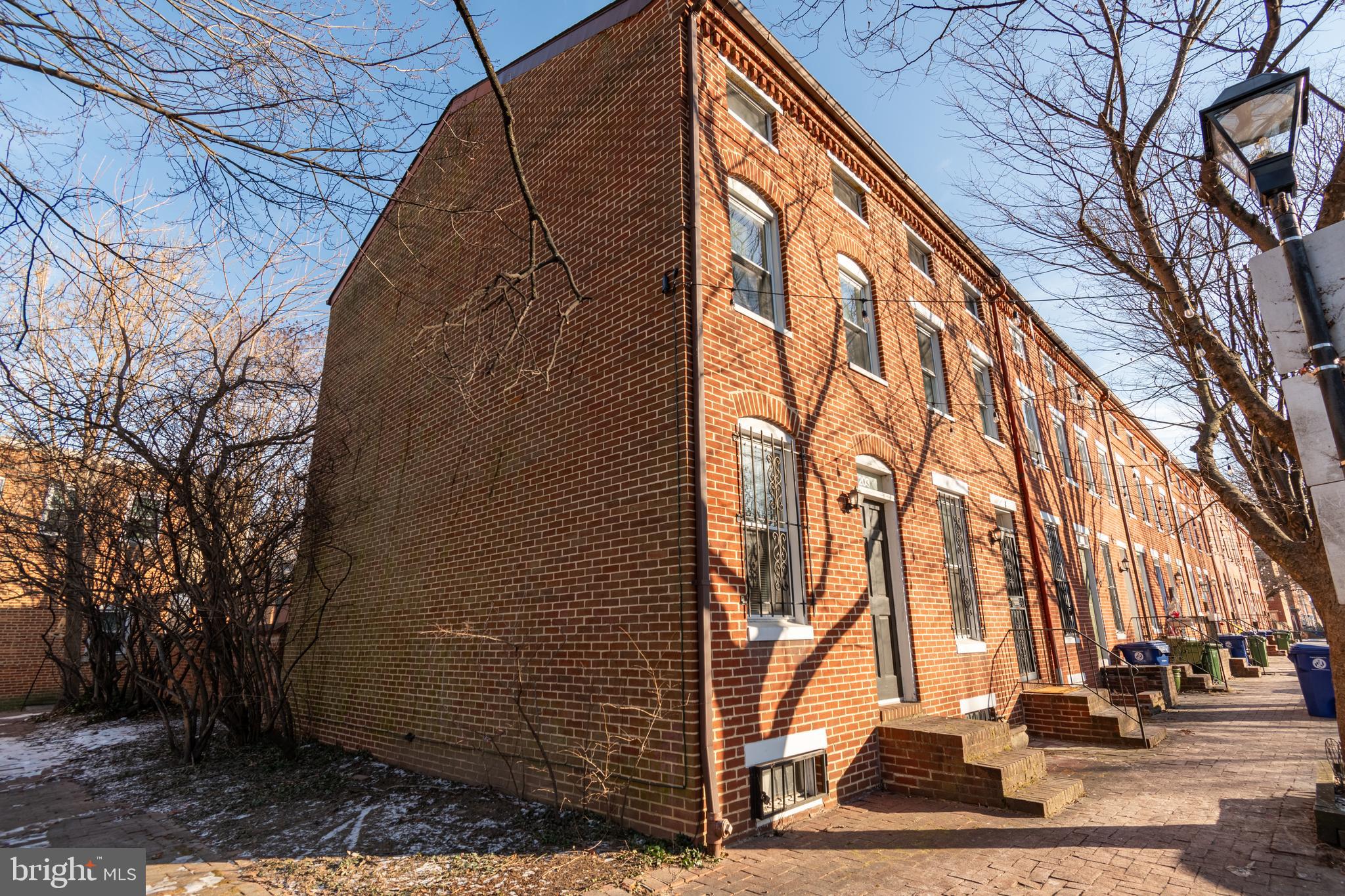 205 Scott Street Baltimore, MD 21230 - Photo 49 of 51 a backyard of a house with lots of green space