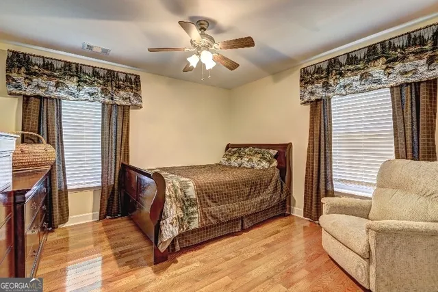 a bed room with a bed and a couch