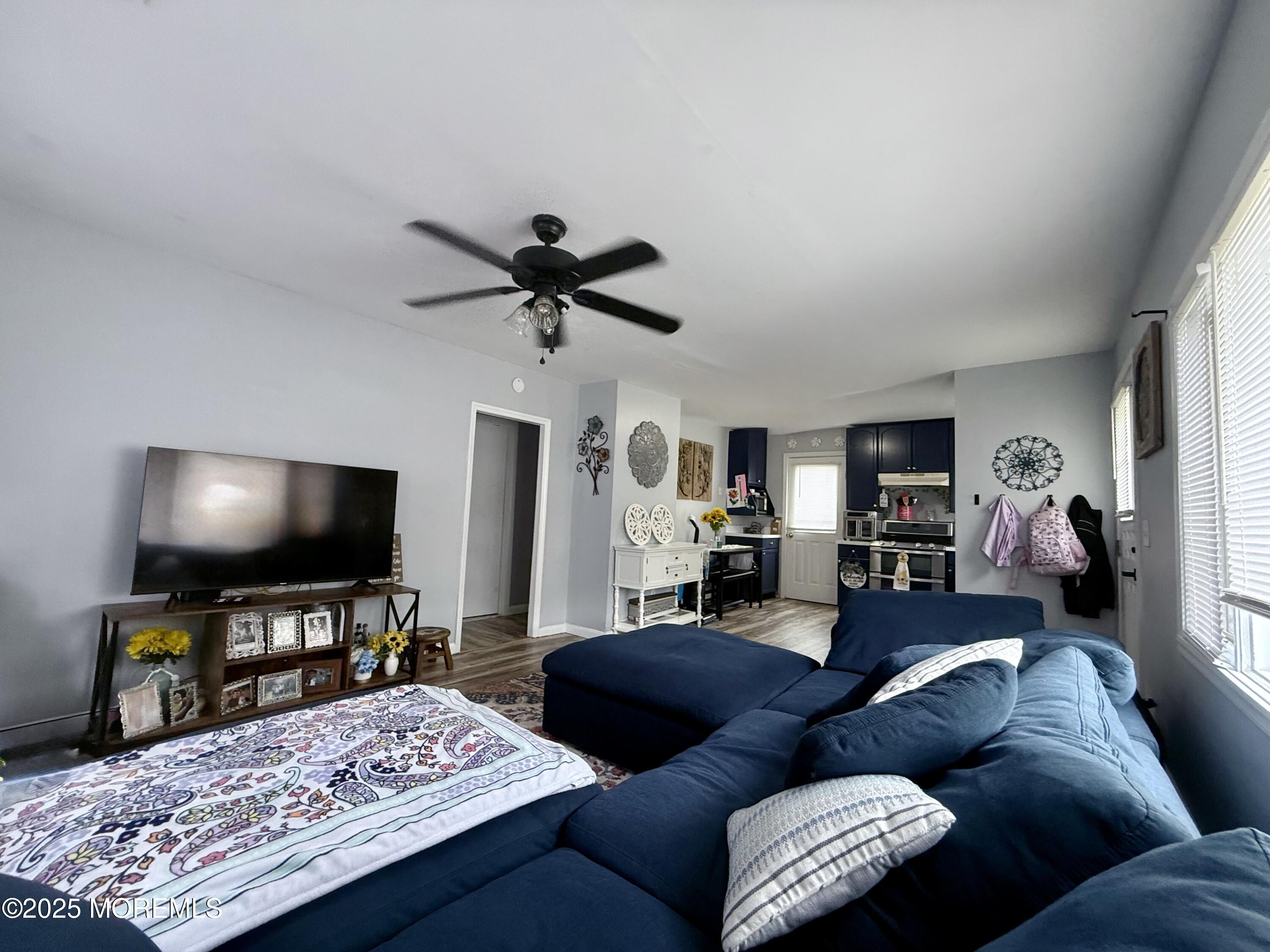 13 Middlesex Avenue Keyport, NJ 07735 - Photo 3 of 12 a living room with furniture and a flat screen tv