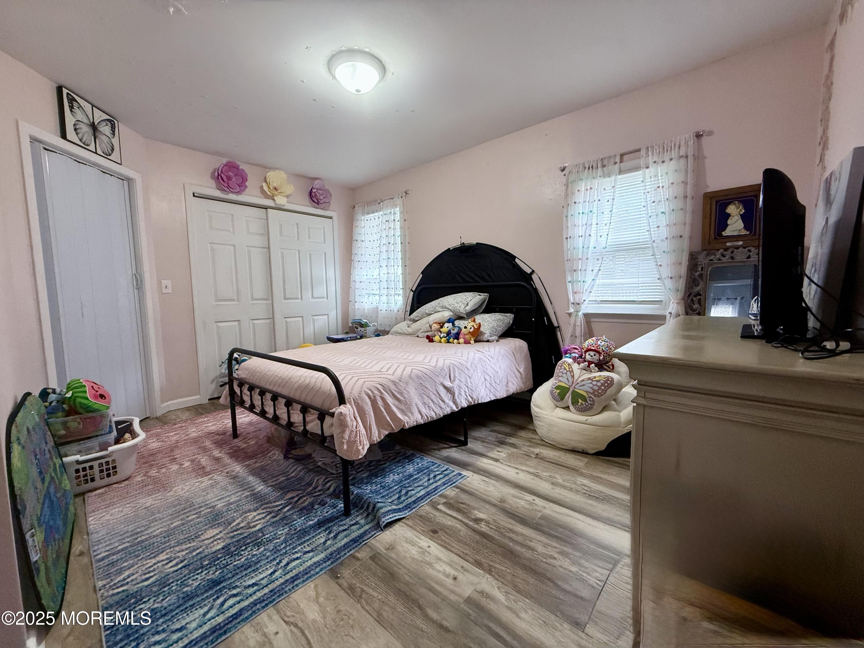 13 Middlesex Avenue Keyport, NJ 07735 - Photo 7 of 12 a bedroom with bed and a window