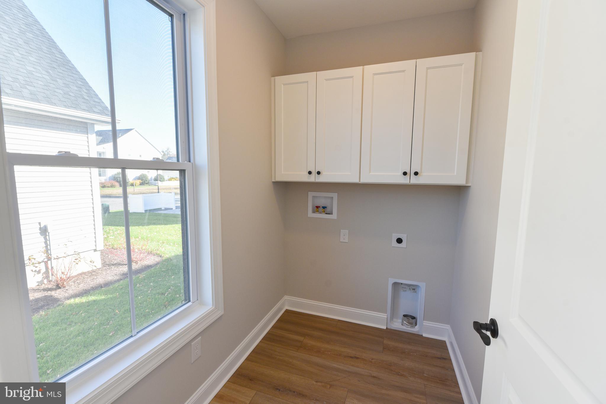 32667 Back Nine Way, Unit 3857 Long Neck, DE 19966 - Photo 31 of 74 a view of an empty room with a window