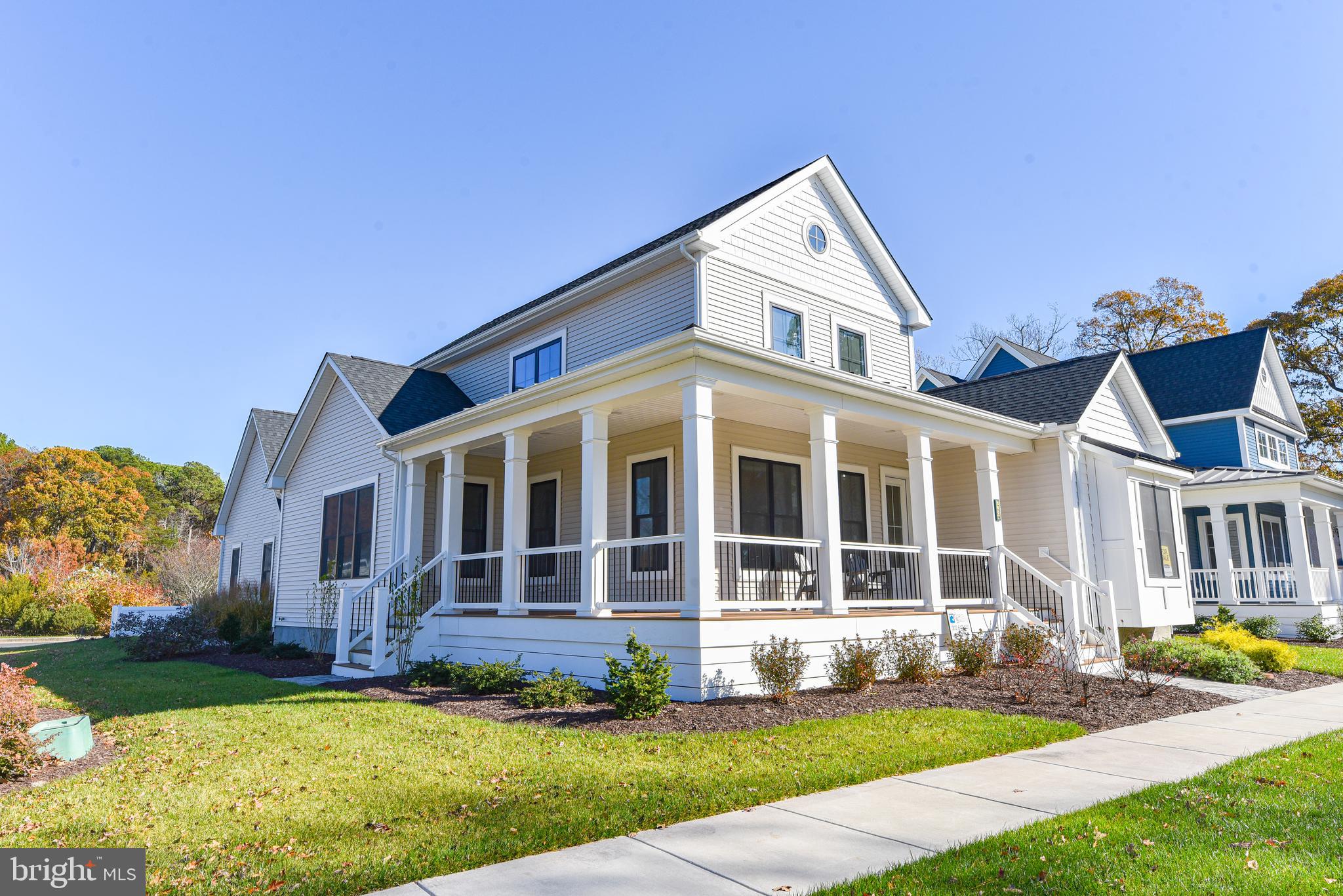 32667 Back Nine Way, Unit 3857 Long Neck, DE 19966 - Photo 74 of 74 front view of a house with a yard