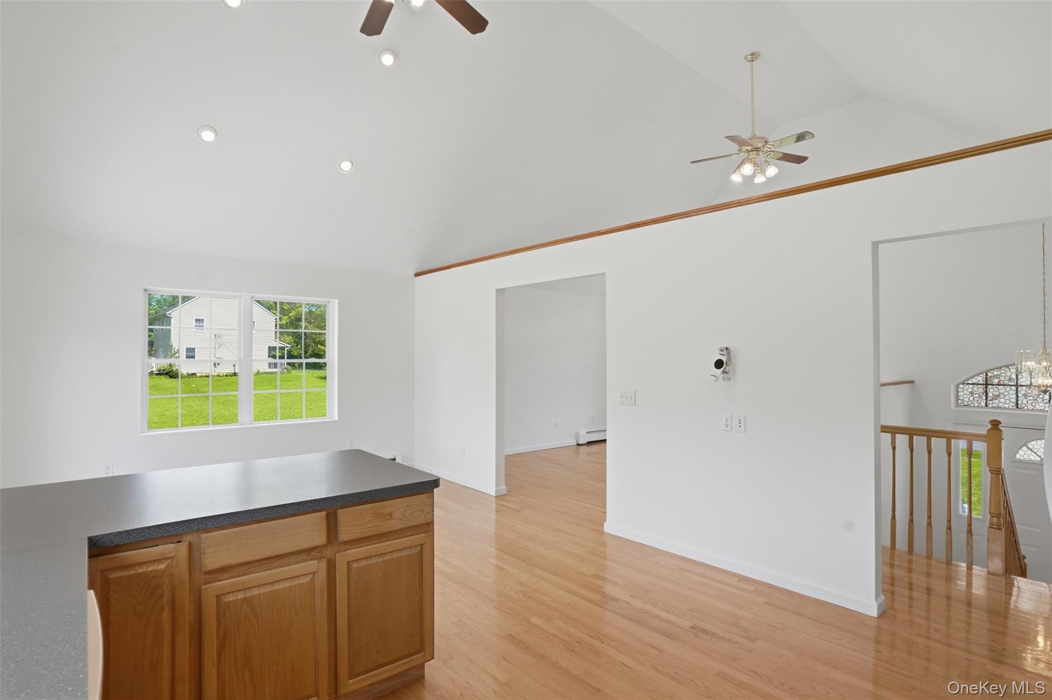 160 Pirog Road Pine Bush, NY 12566 - Photo 17 of 50 a kitchen with window and wooden floor