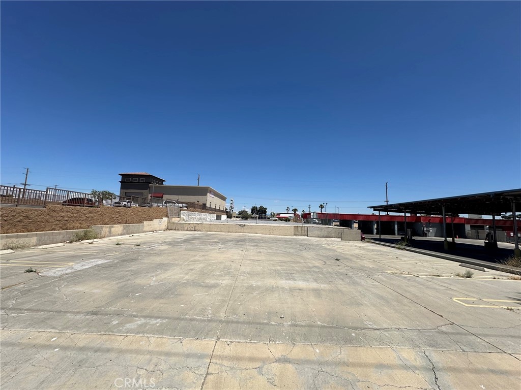17153 Bear Valley Road Hesperia, CA 92345 - Photo 4 of 9 a view of a parking space in front of a building