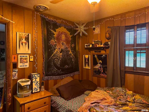a living room with lots of furniture and a flat screen tv