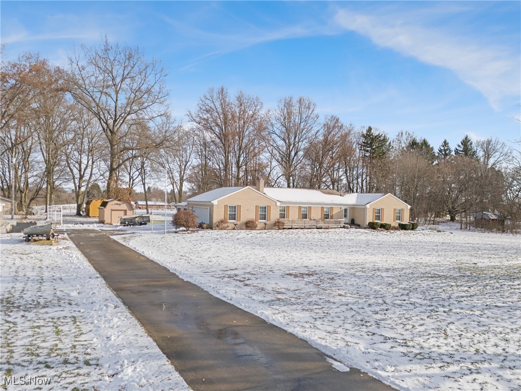 14965 Seacrist Road Salem, OH 44460 - Photo 3 of 43 Ranch-style home featuring a shed