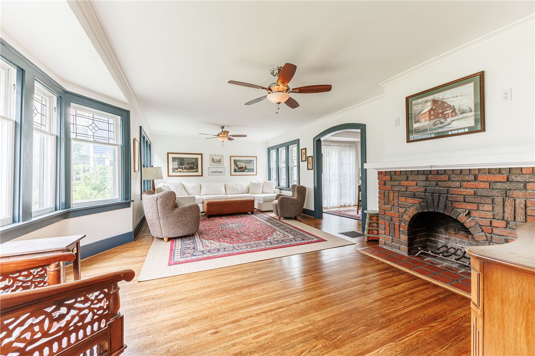 55 Elm Drive Rochester, NY 14609 - Photo 3 of 31 Spacious Living Room with leaded glass bay window and gorgeous hardwood floors!