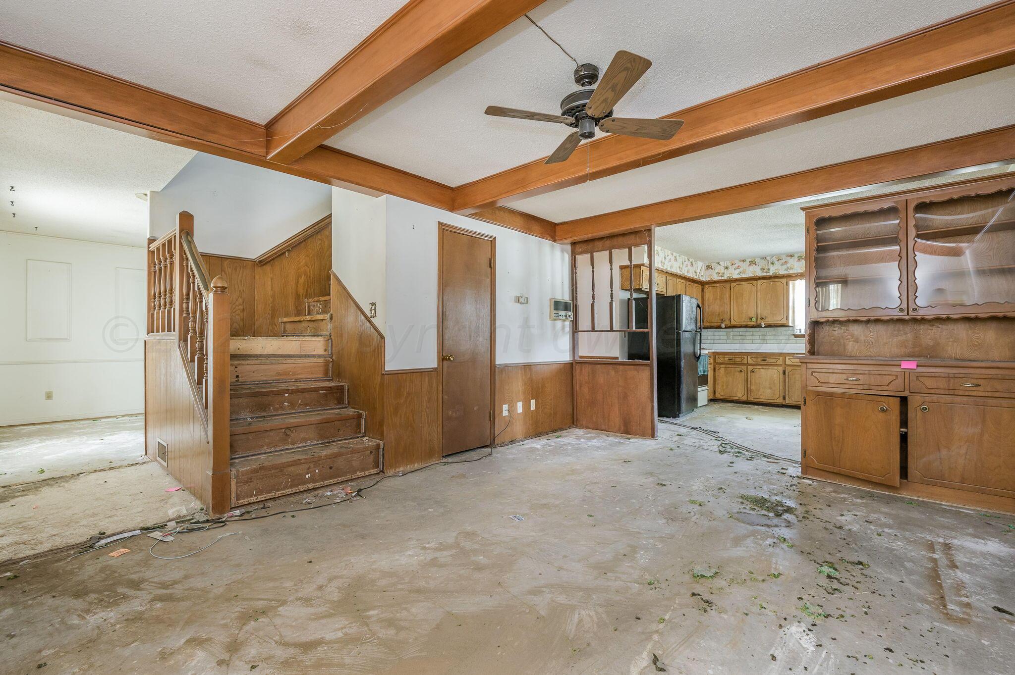 503 Cherry Avenue Dumas, TX 79029 - Photo 2 of 13 a view of a hallway with closet and utility room