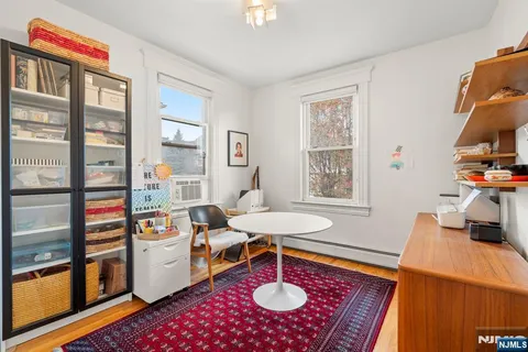 a very nice looking living room with a large window