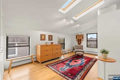 a room with furniture and a window