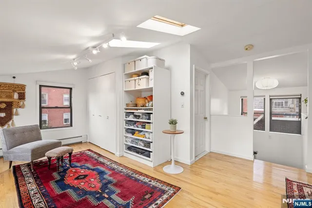 a living room with furniture and window