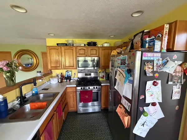 a kitchen with lots of counter top space and a stove