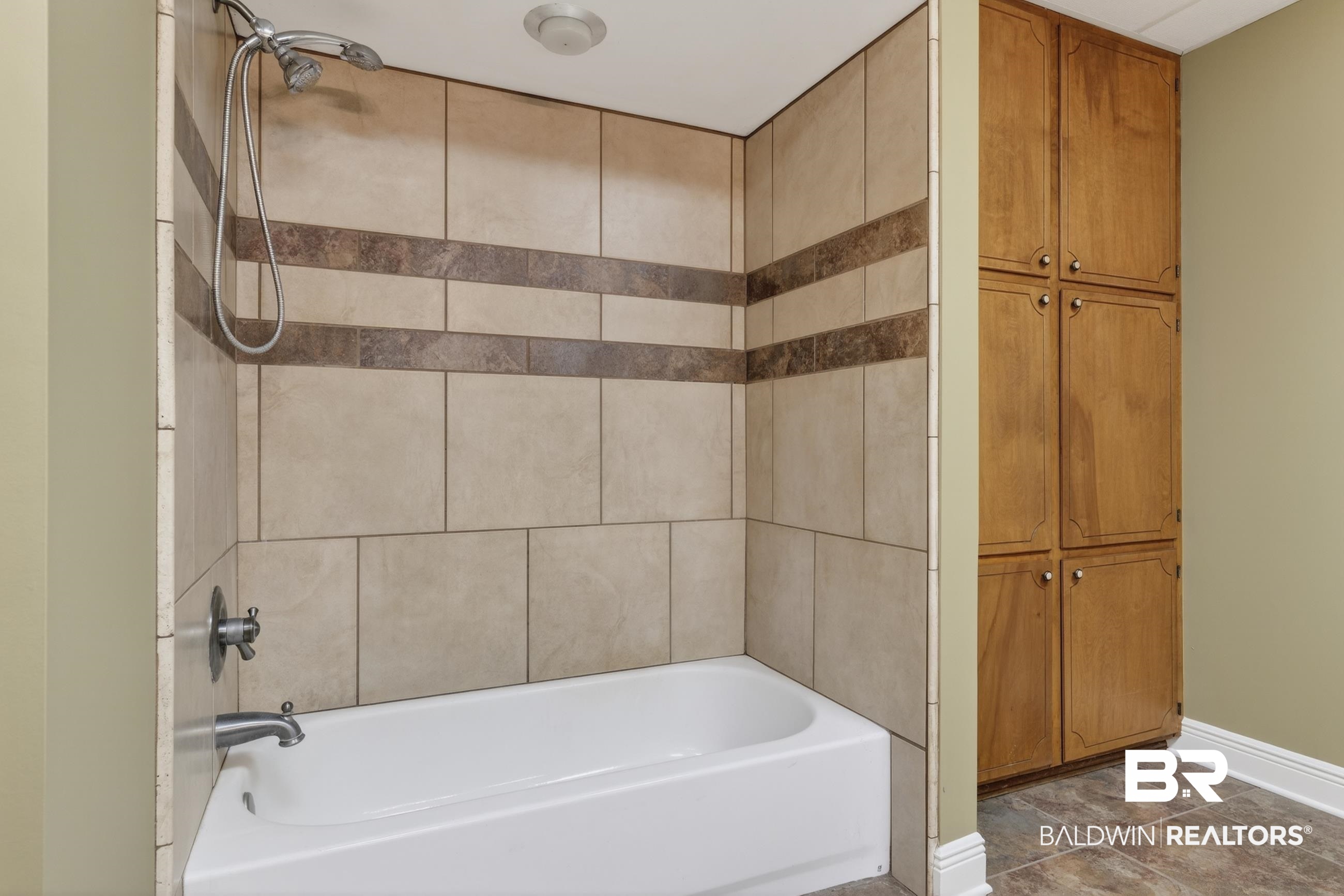 3175 Dawes Lake Road Mobile, AL 36619 - Photo 65 of 92 Bathroom featuring bathing tub / shower combination and baseboards