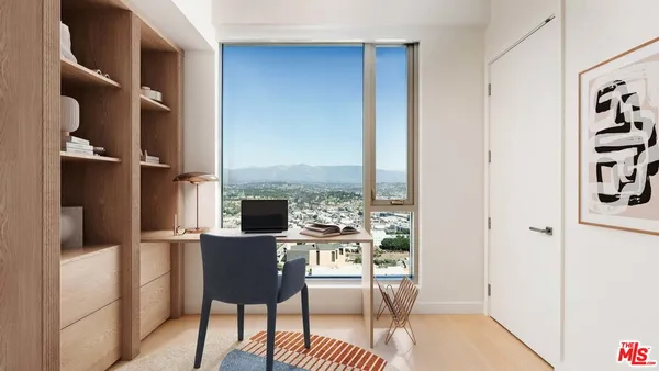 a dining room with furniture and a floor to ceiling window