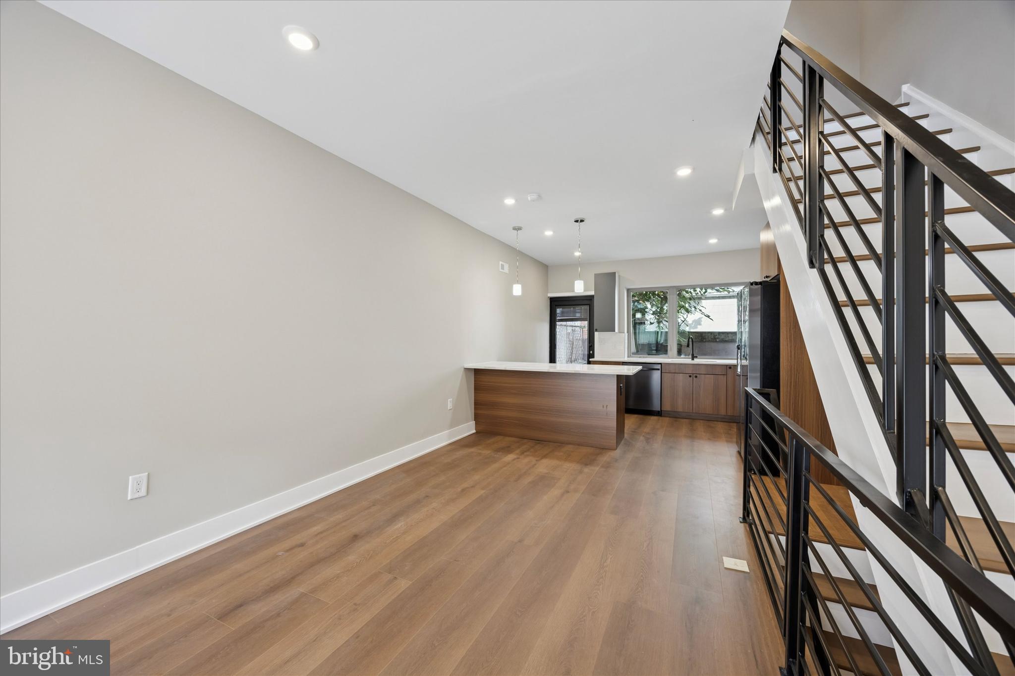 523 Gerritt Street Philadelphia, PA 19147 - Photo 4 of 35 a view of a hallway with wooden floor and furniture