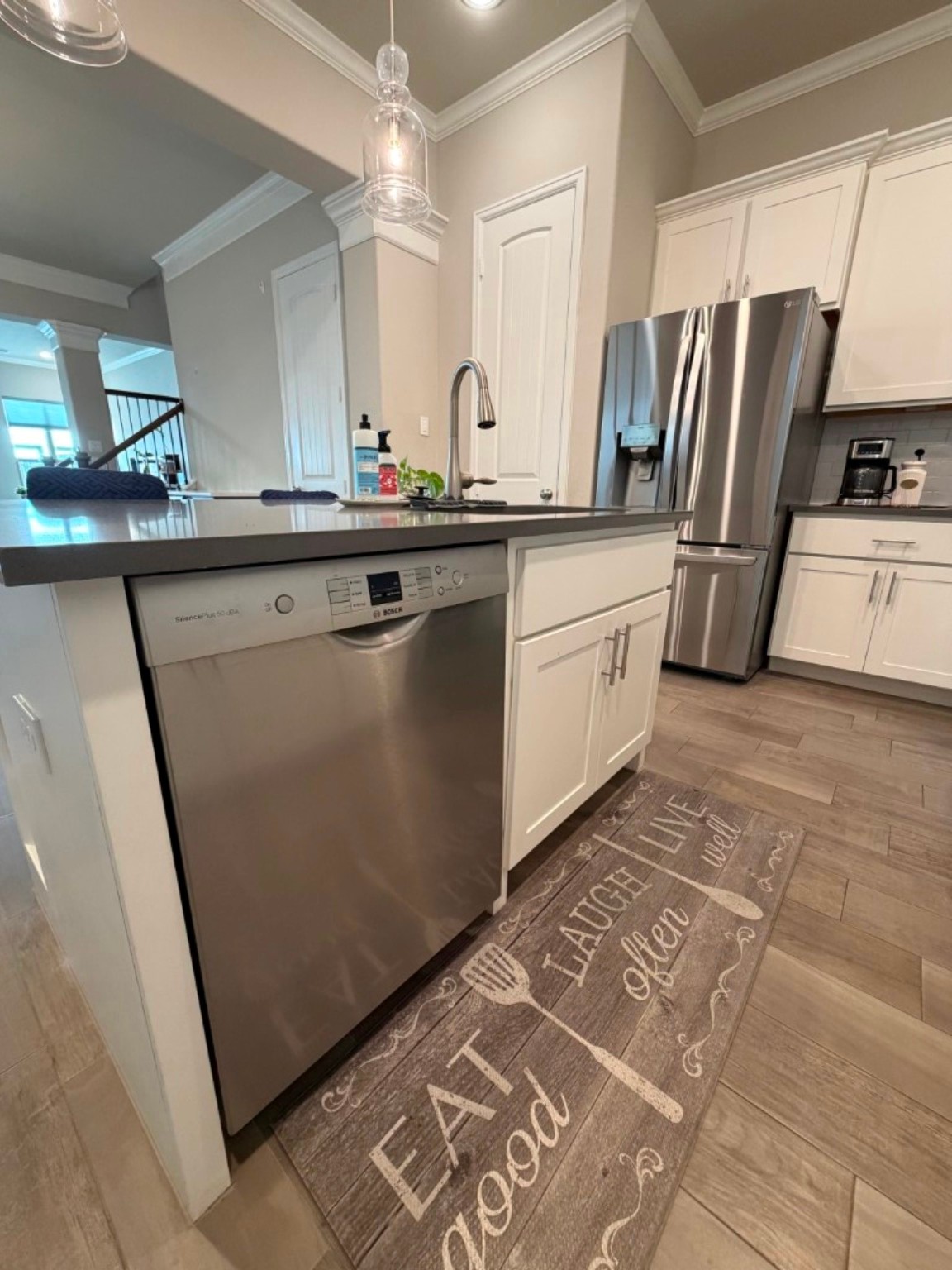 4610 Center Street Houston, TX 77007 - Photo 11 of 36 a kitchen with stainless steel appliances a sink and a refrigerator