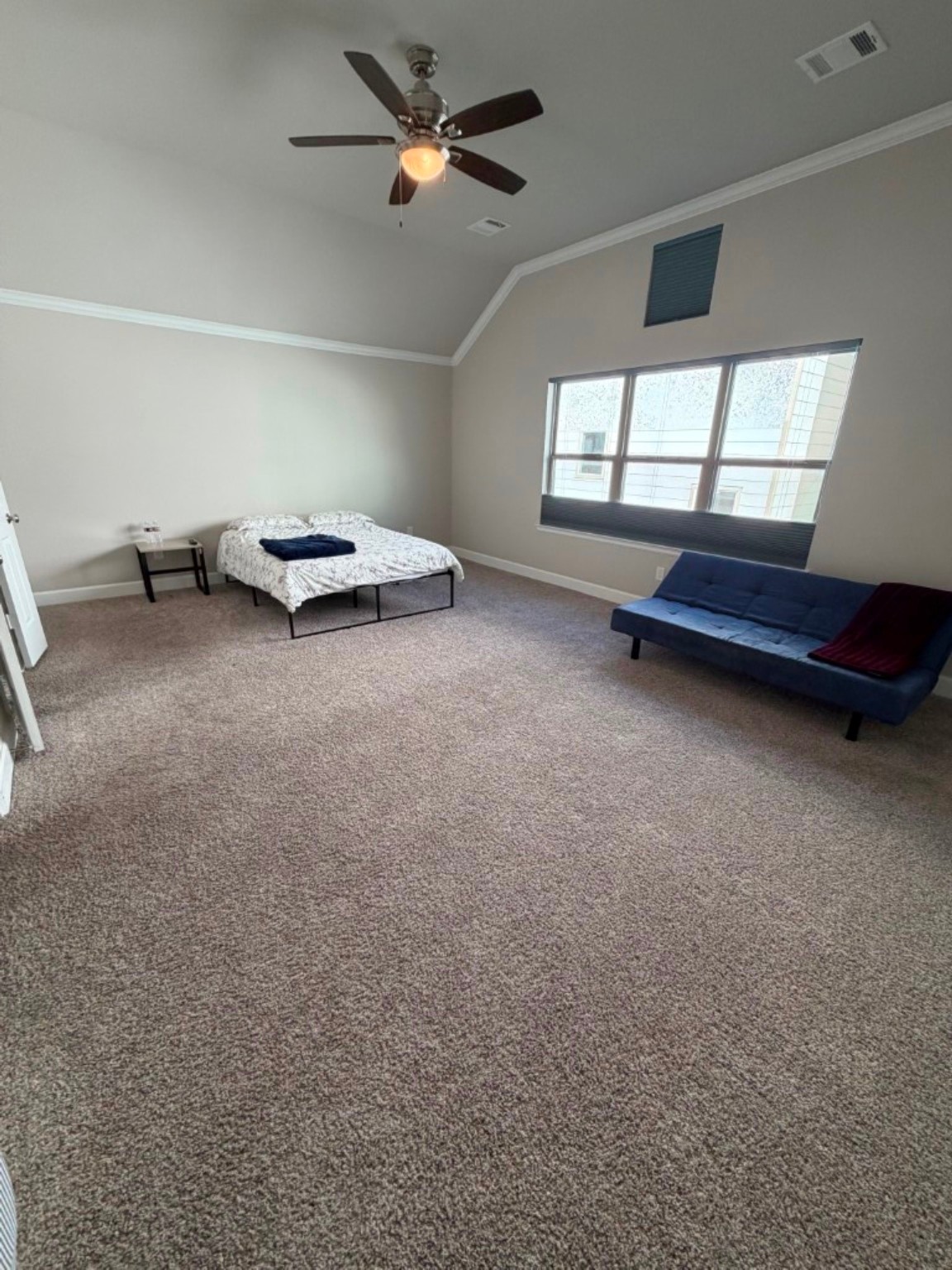 4610 Center Street Houston, TX 77007 - Photo 16 of 36 an empty room with windows and ceiling fan