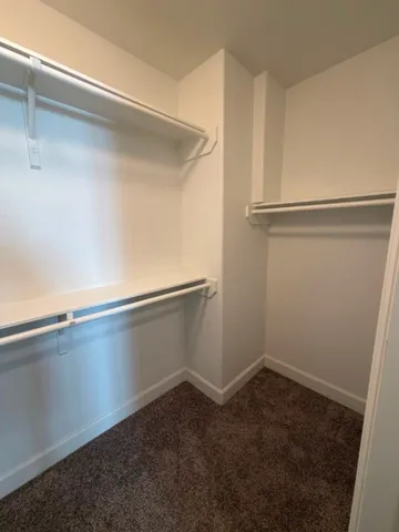 a view of an empty walk in closet