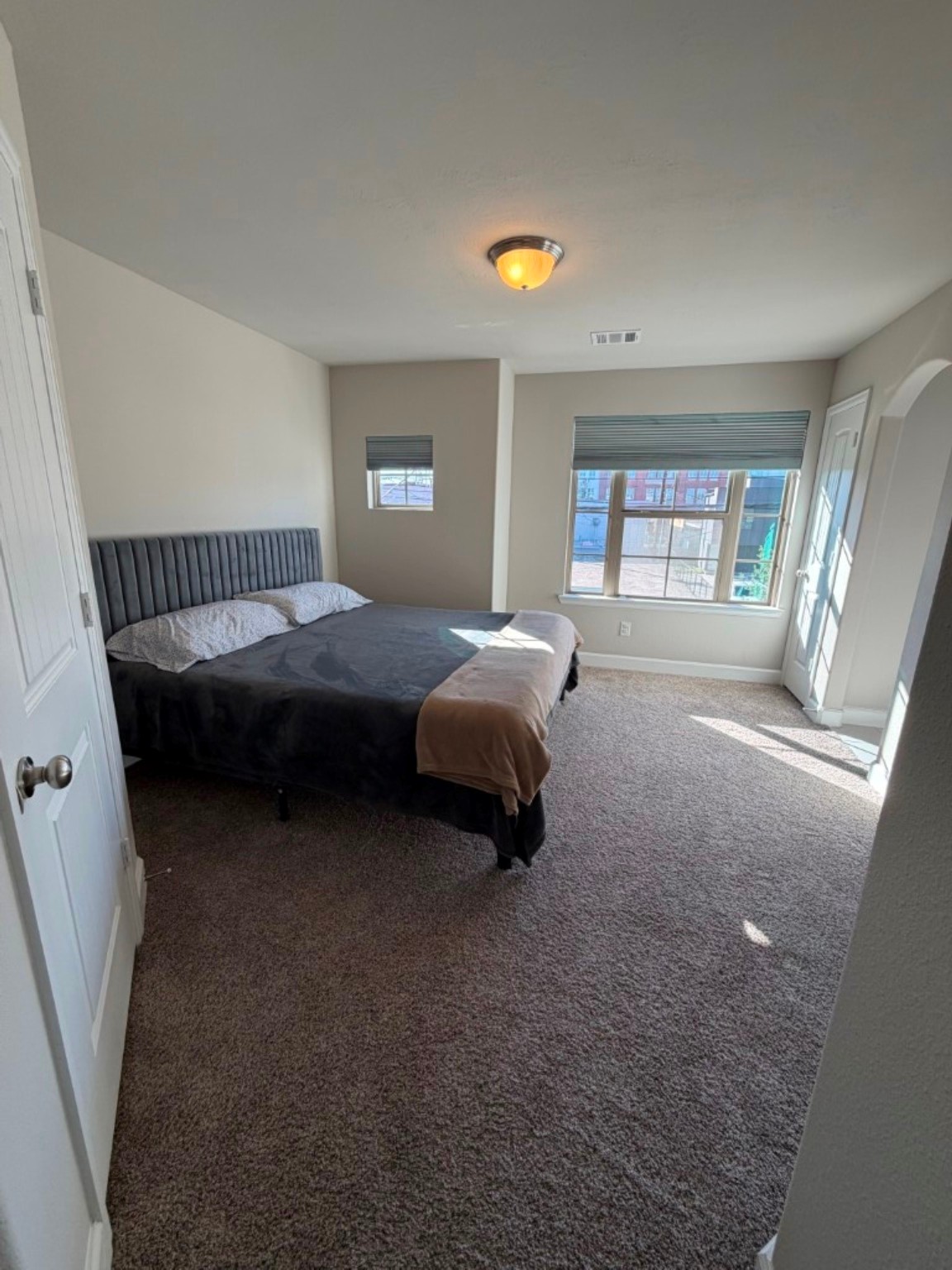 4610 Center Street Houston, TX 77007 - Photo 21 of 36 a bedroom with a bed and a window