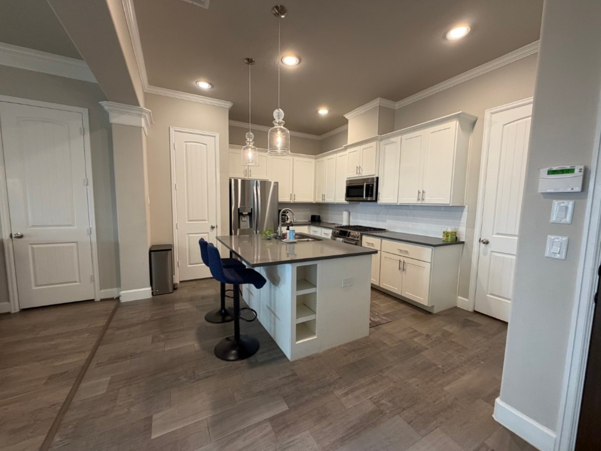 4610 Center Street Houston, TX 77007 - Photo 10 of 36 a kitchen with a refrigerator and a sink