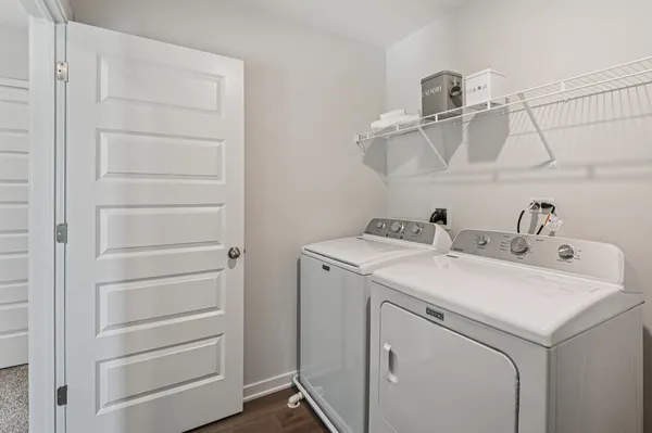 a utility room with dryer and washer