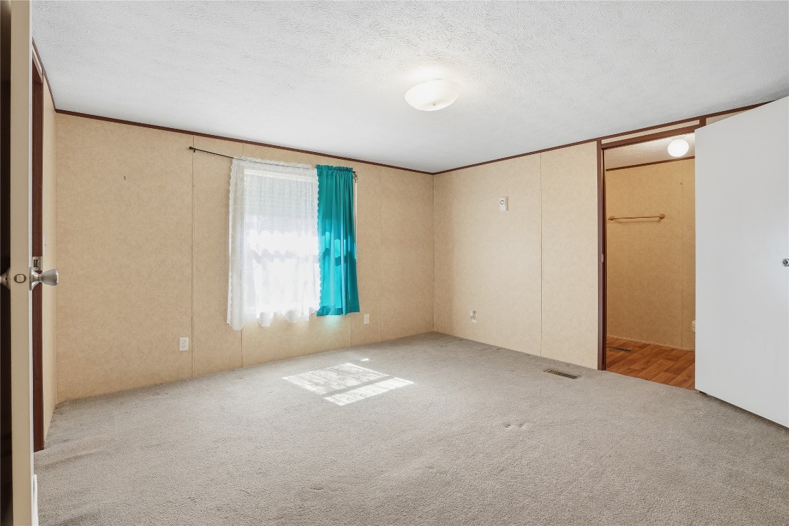 801 Genoa Red Bluff Road Pasadena, TX 77504 - Photo 18 of 33 a view of an empty room with a window