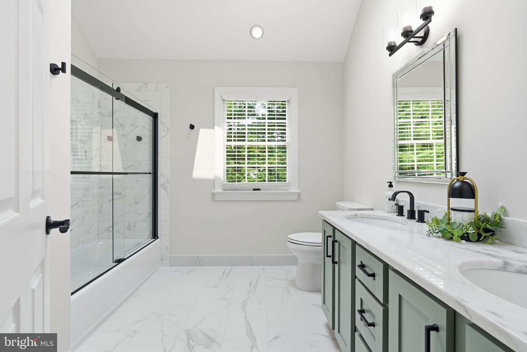 2971 Comfort Road New Hope, PA 18938 - Photo 39 of 60 a bathroom with a granite countertop sink a toilet and shower