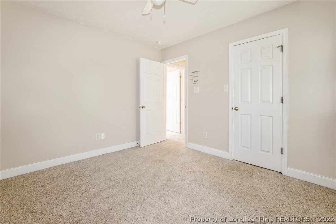 1631 Silver Ridge Court Fayetteville, NC 28304 - Photo 16 of 21 an empty room with a natural light