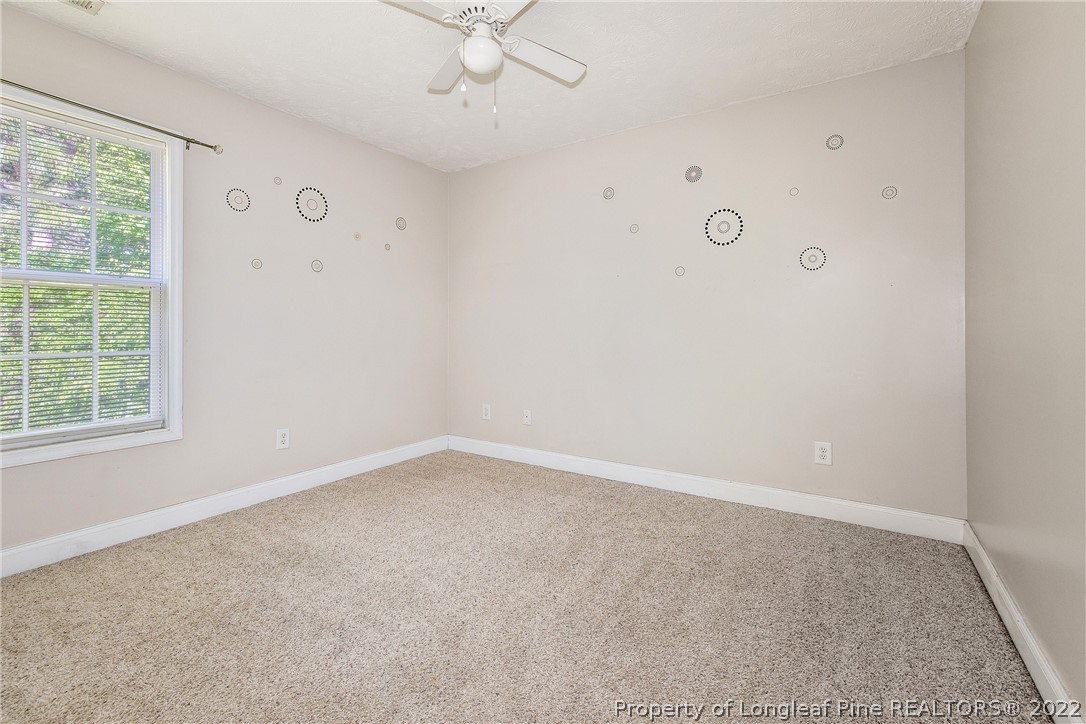 1631 Silver Ridge Court Fayetteville, NC 28304 - Photo 17 of 21 an empty room with a window