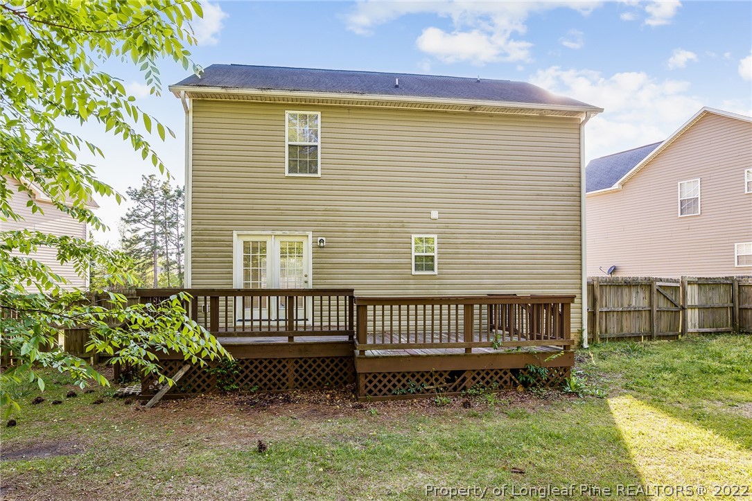 1631 Silver Ridge Court Fayetteville, NC 28304 - Photo 4 of 21 a front view of a house with a garden