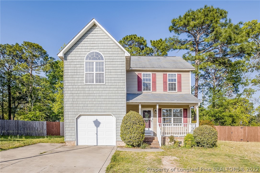 1631 Silver Ridge Court Fayetteville, NC 28304 - Photo 6 of 21 a front view of a house with garden